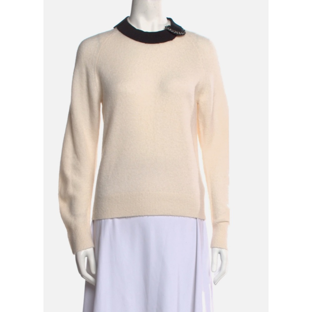 Elegant Cream Sweater with Black Collar
